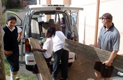 Green kids load up the van